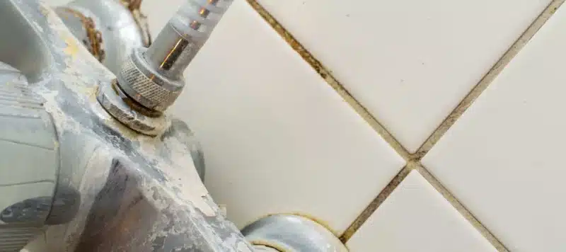 hard water residues on bathroom fixtures