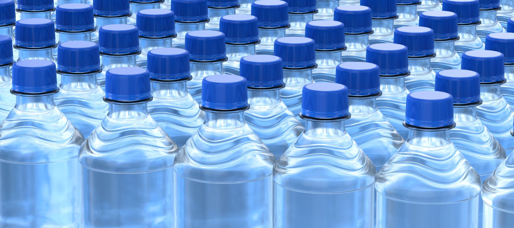 rows and rows of blue lid plastic water bottles