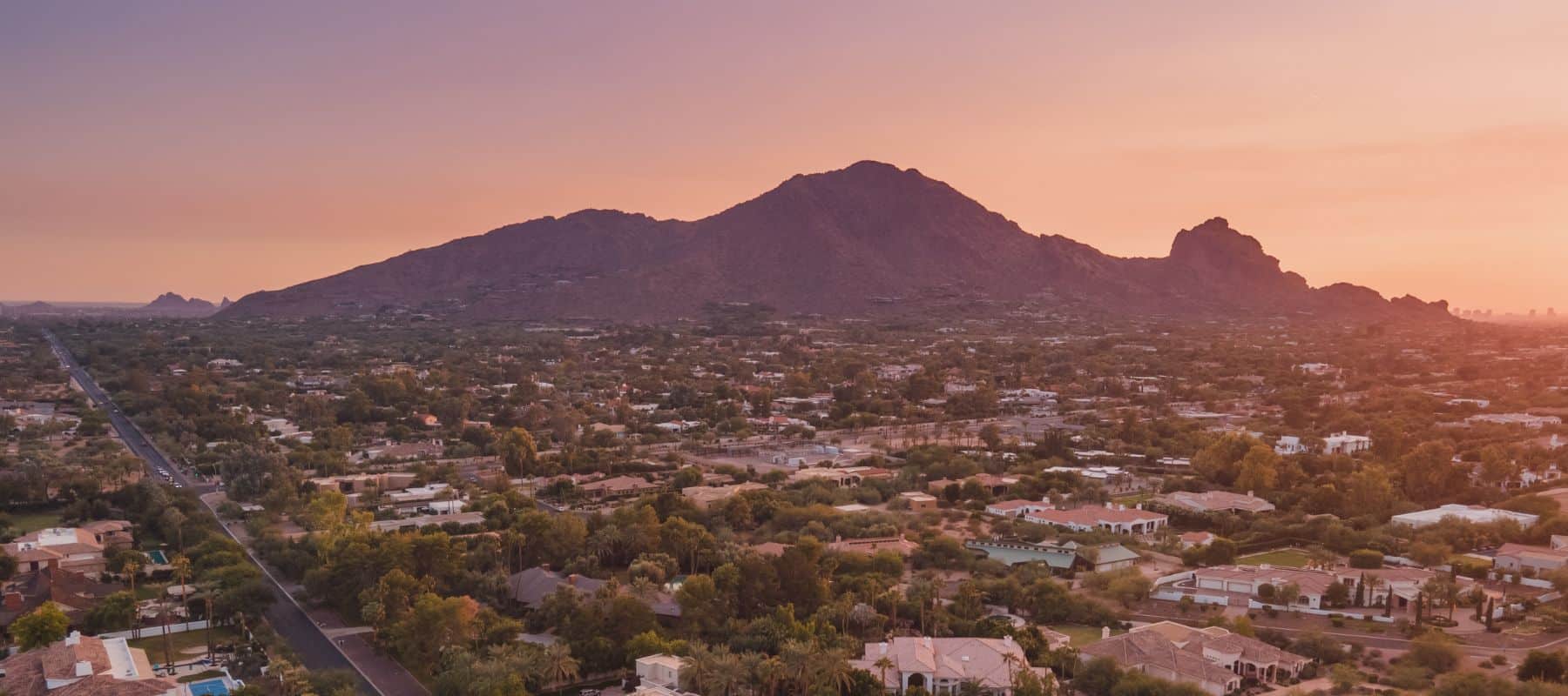 wide shot of camelback mountain in scottsdale arizona at dusk