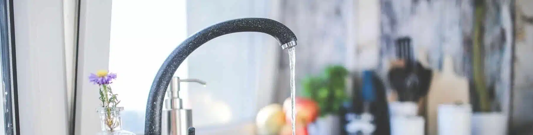 water coming out of a faucet