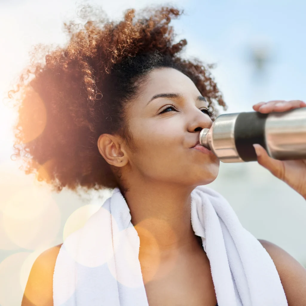 Brunette_drinking water_from_flask_HR (2)